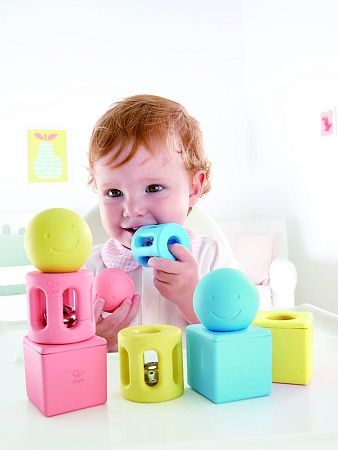 HAPE Игрушка для малышей конструктор - погремушка "Улыбка", 9 предметов